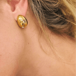 Gold teardrop shape earrings with clear glass gemstones