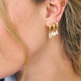 Little gold hoops with crystal initial charms