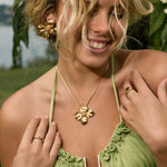 Model in summer jewellery | large flower earrings and necklace 