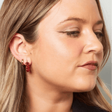 Red crystal earrings on two broke chicks