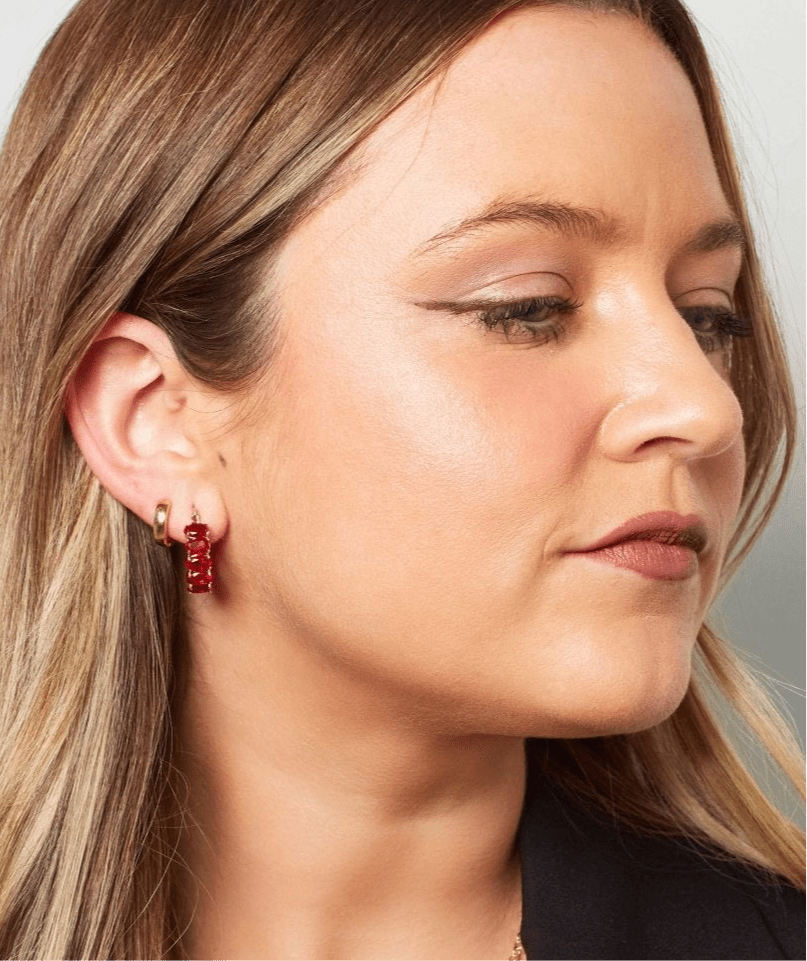 Red crystal earrings on two broke chicks