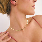 Model in Gold Serpent necklace in 18k Gold Fill