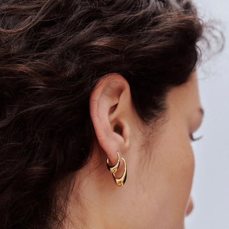 Gold Noma teardrop hoop earrings