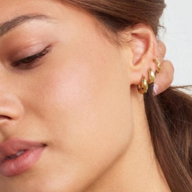 Model in Bixby and Co earring stack 